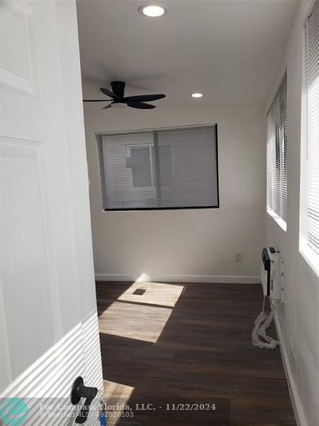 a workspace with wooden cabinet