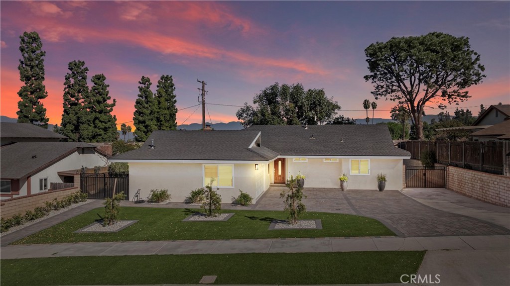 a view of house with outdoor space and street view