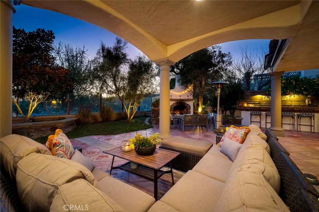 a view of a backyard with swimming pool