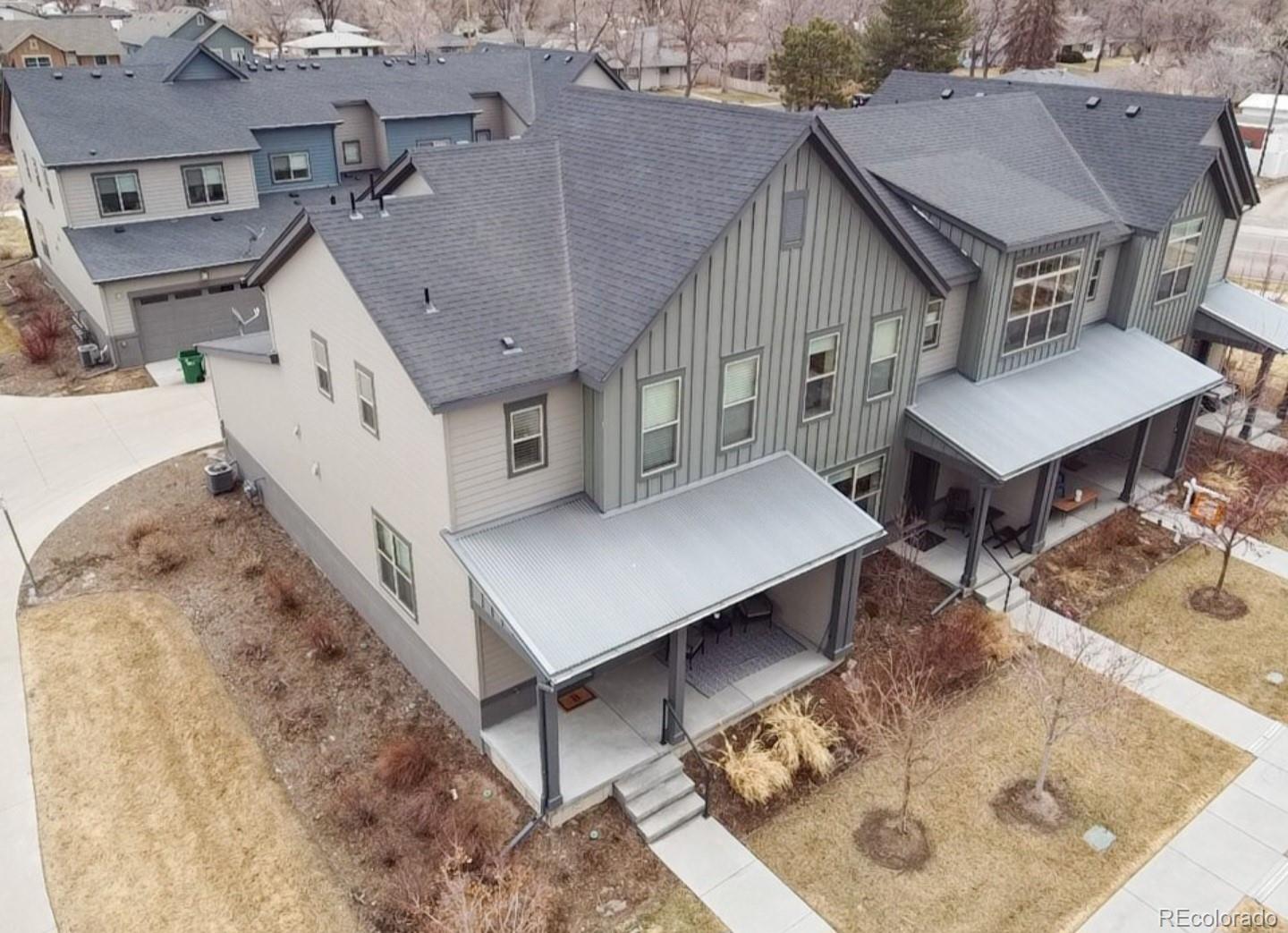 an aerial view of a house with swimming pool