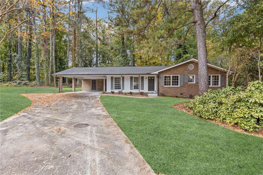 front view of a house with a yard