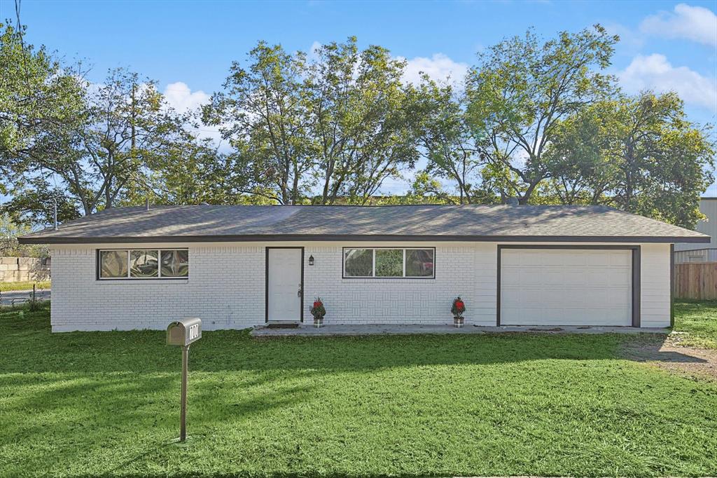 a front view of house with yard