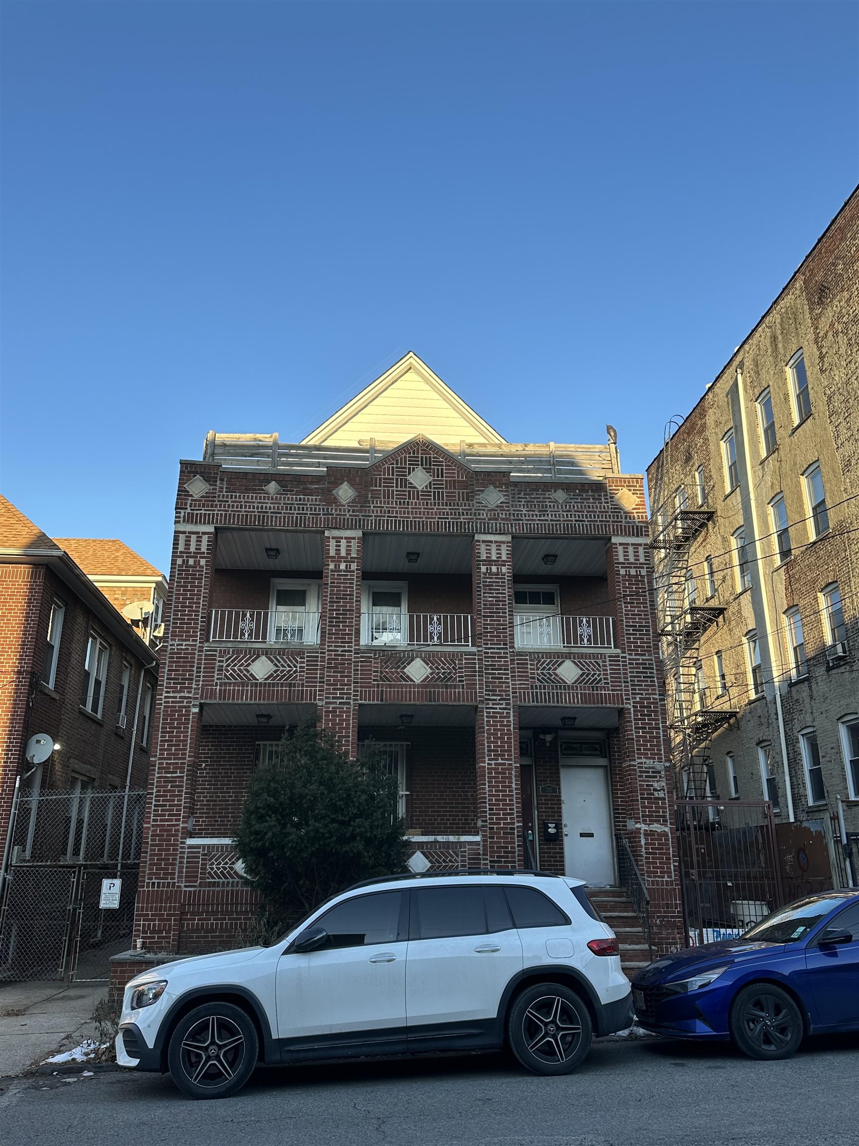 a car parked in front of a house