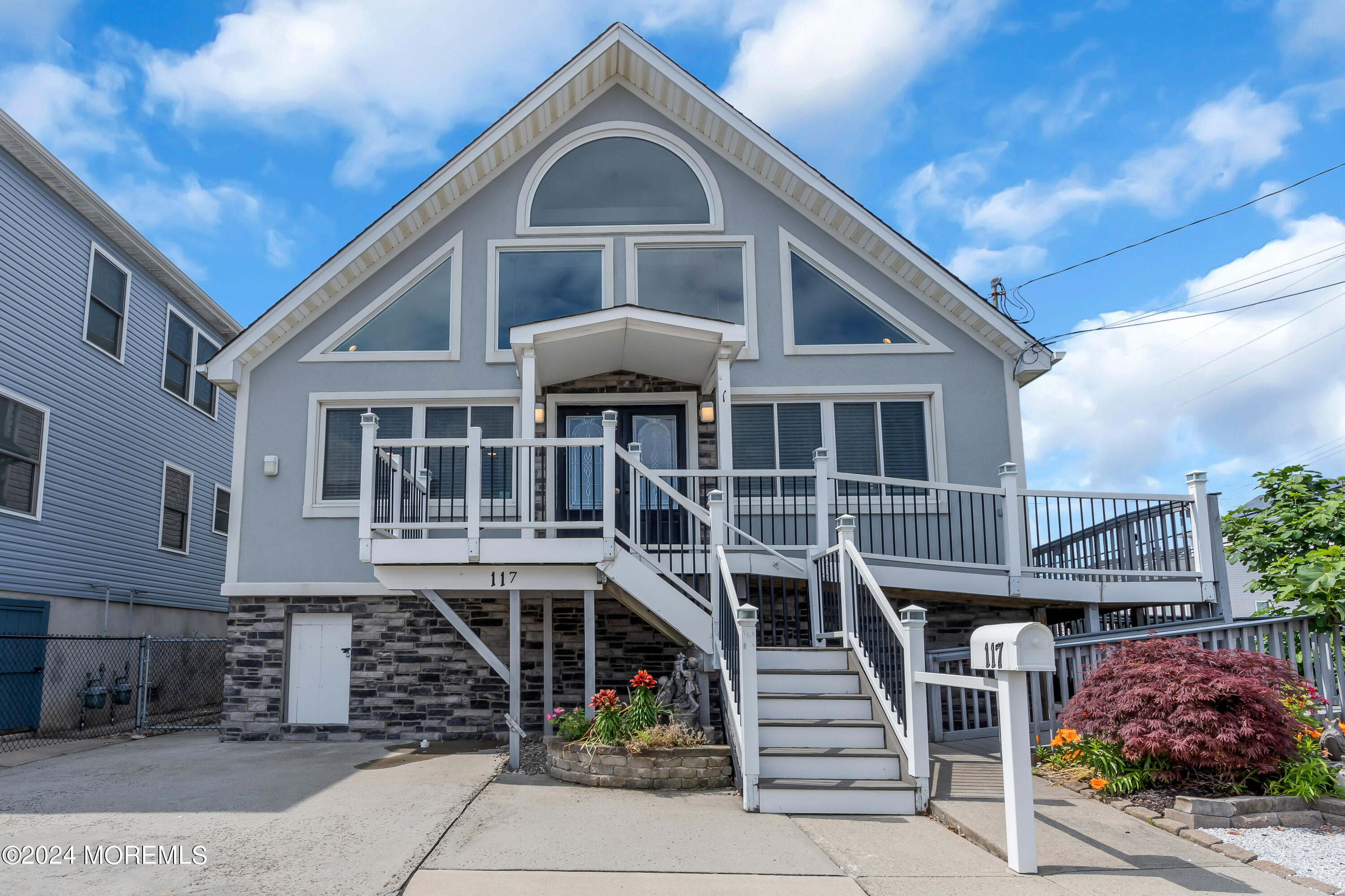 a front view of a house with a porch