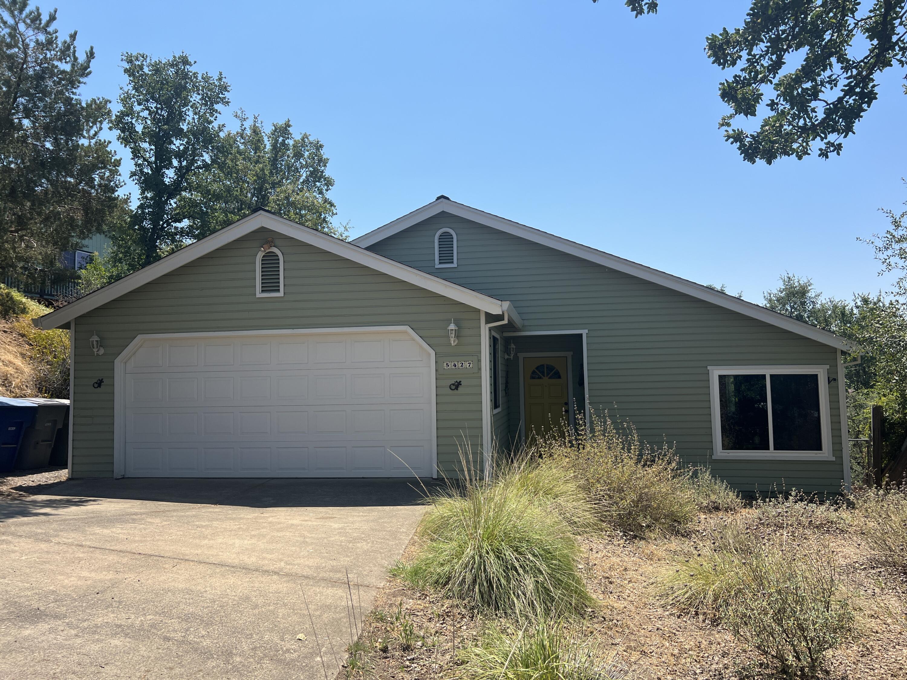 a front view of house with yard