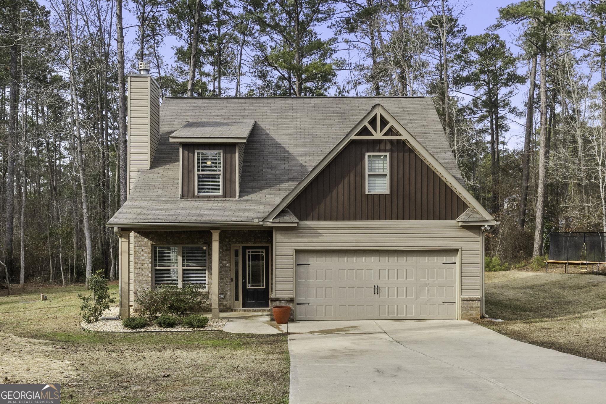 front view of a house with yard