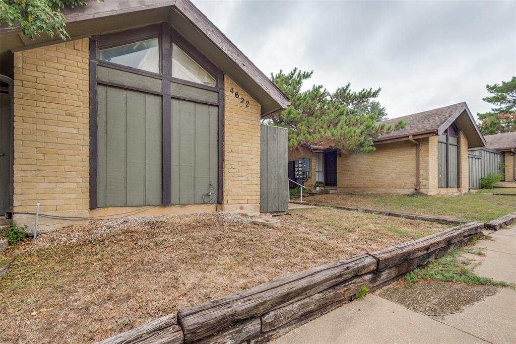 a house with trees in front of it