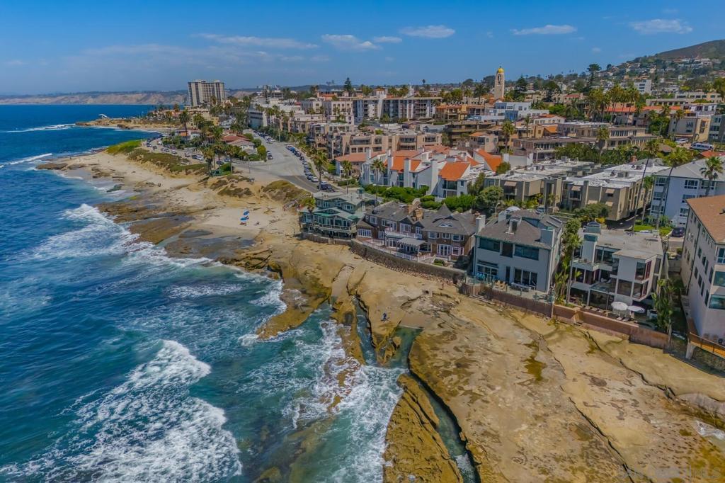 a view of a city with lawn chairs