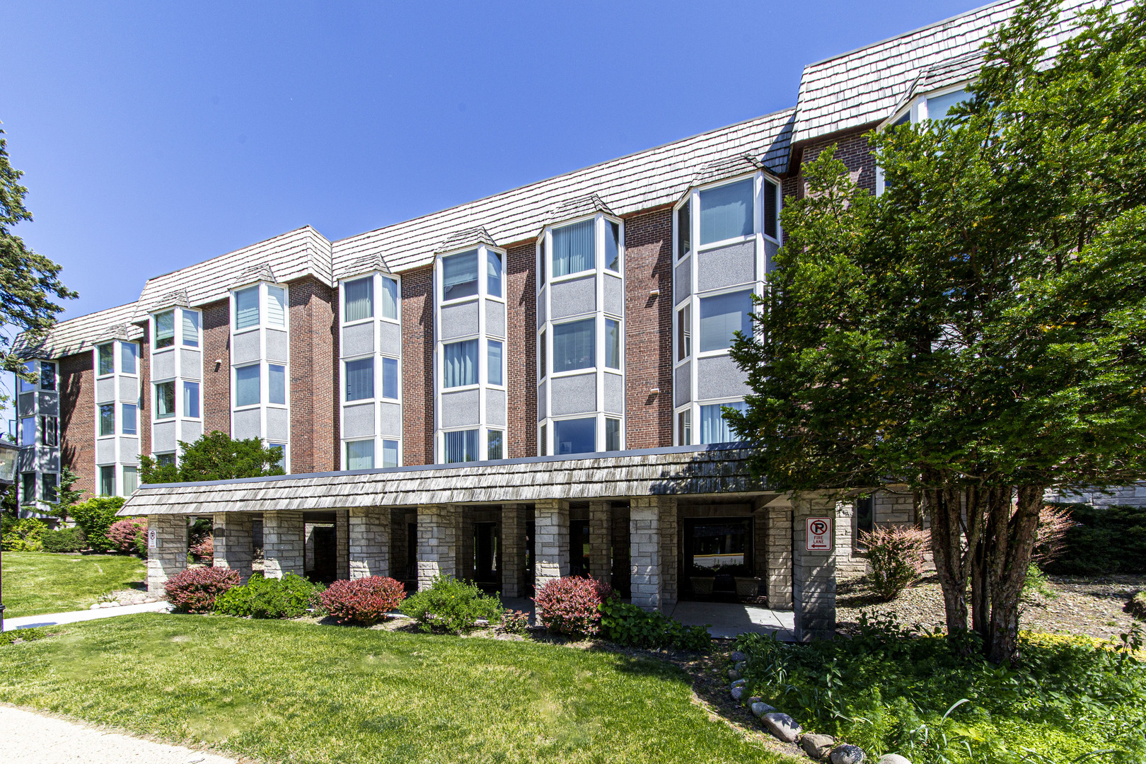 a view of an apartment with a garden and plants