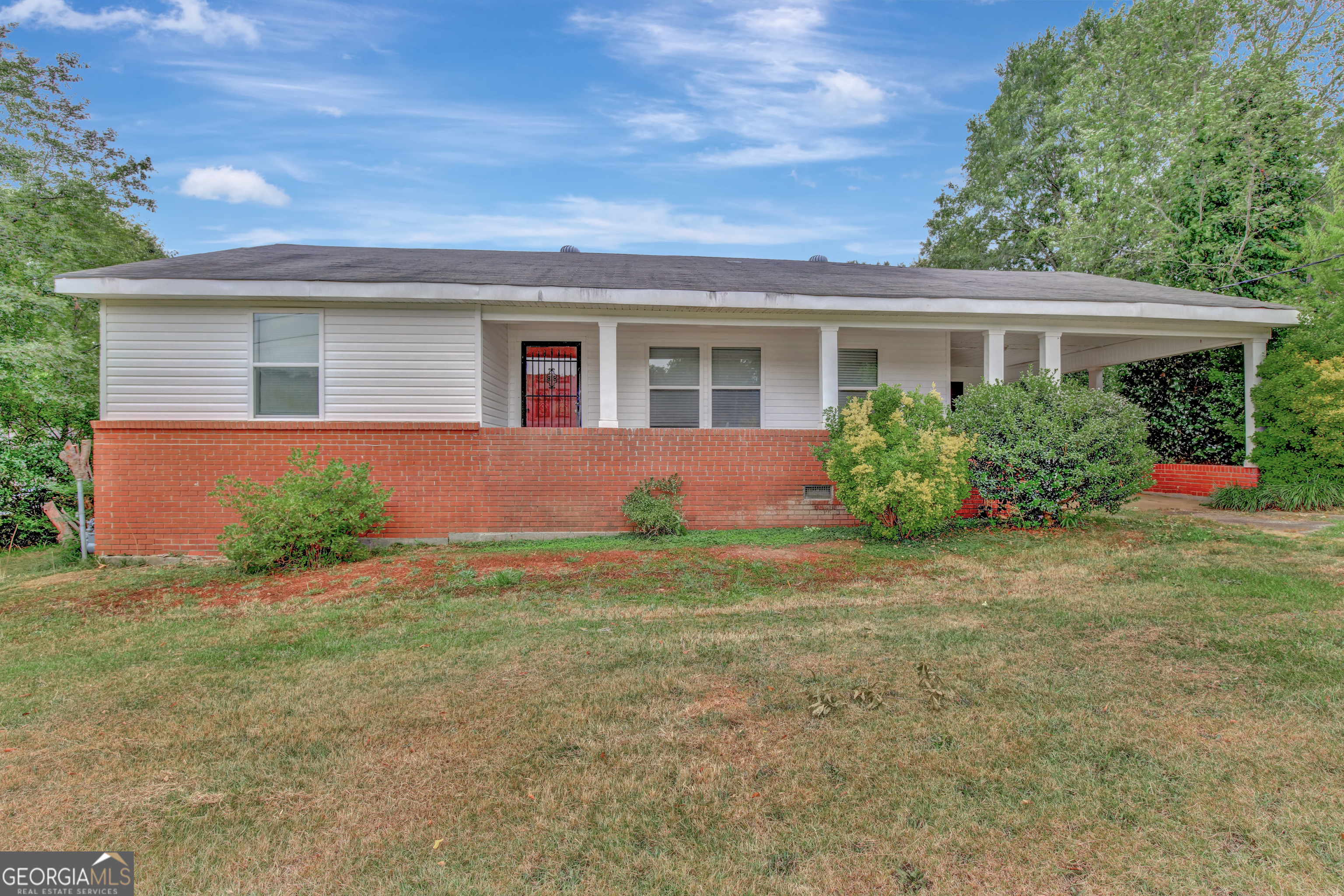 front view of house with a yard