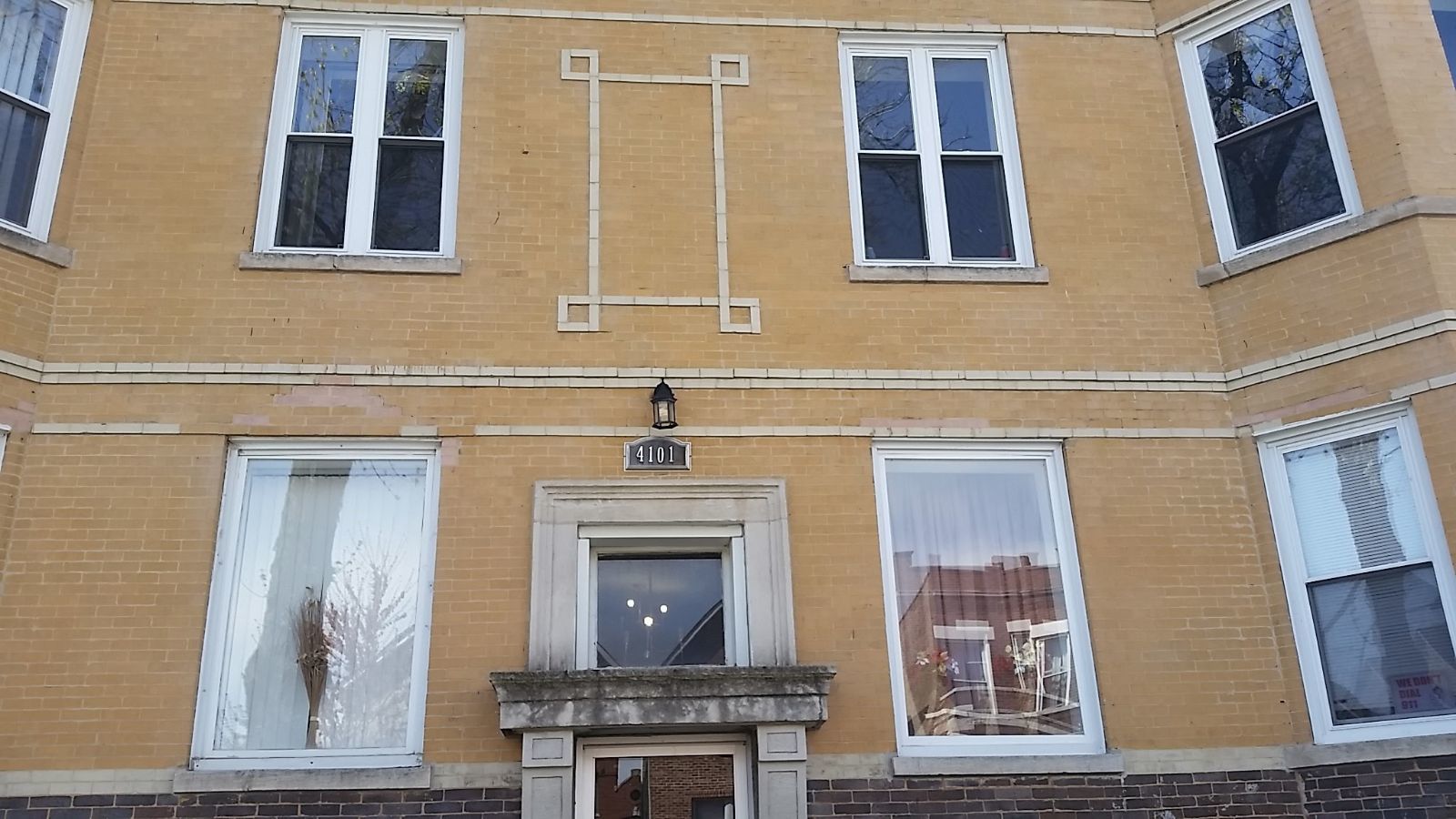 a front view of a house with a front door