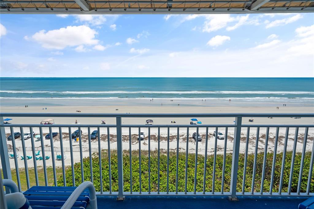 a view of a balcony with lake view