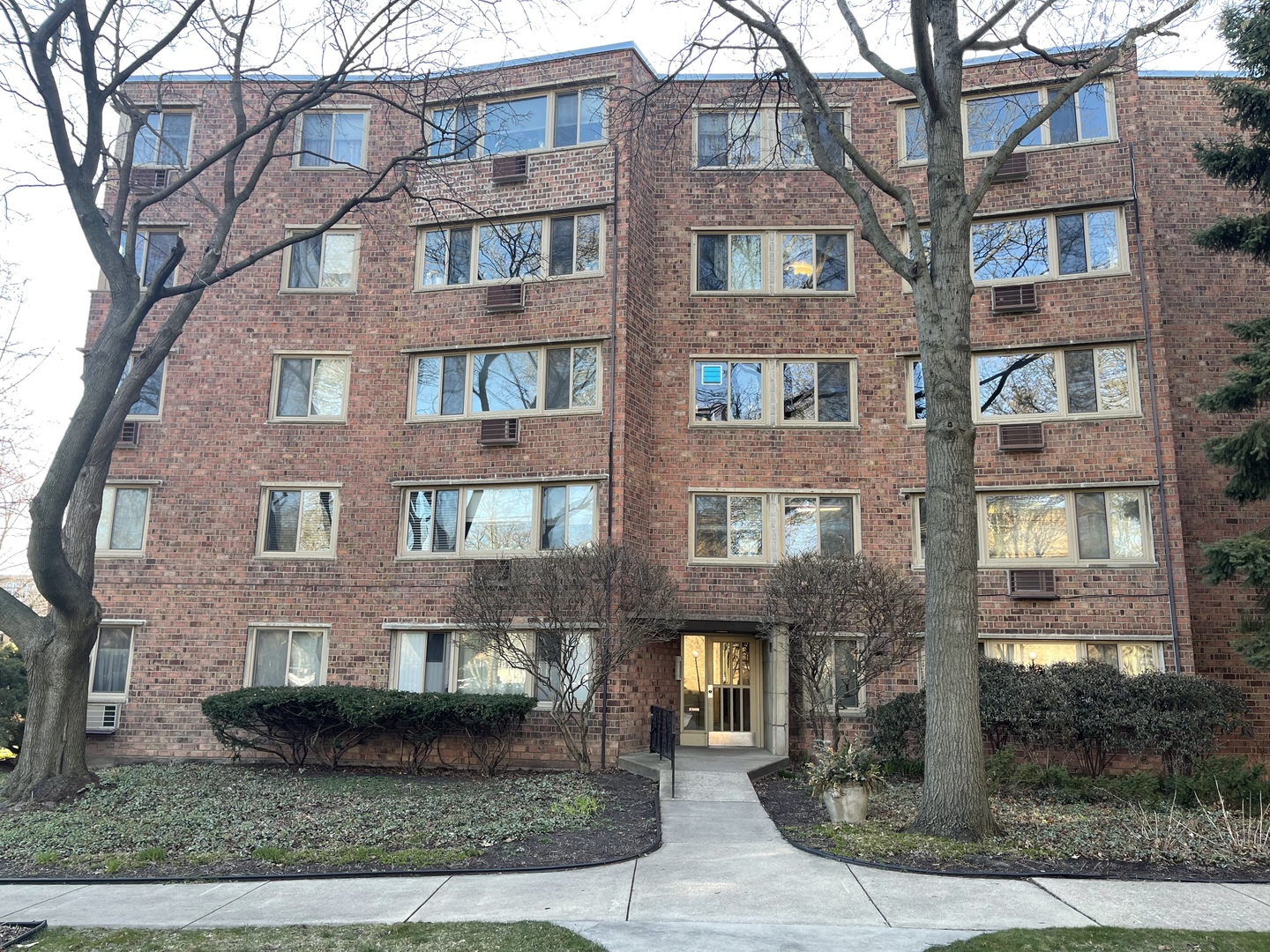 a front view of a brick building