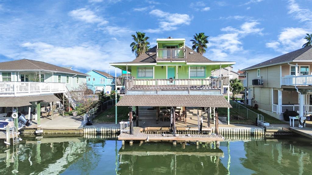 a front view of a house with a boat