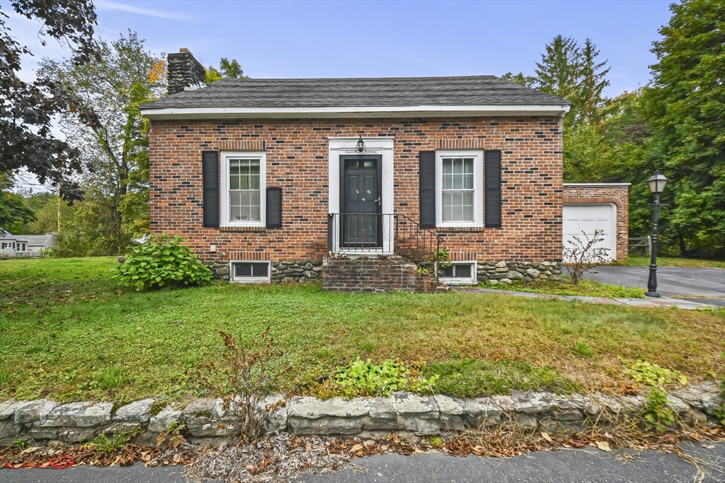 a front view of house with yard