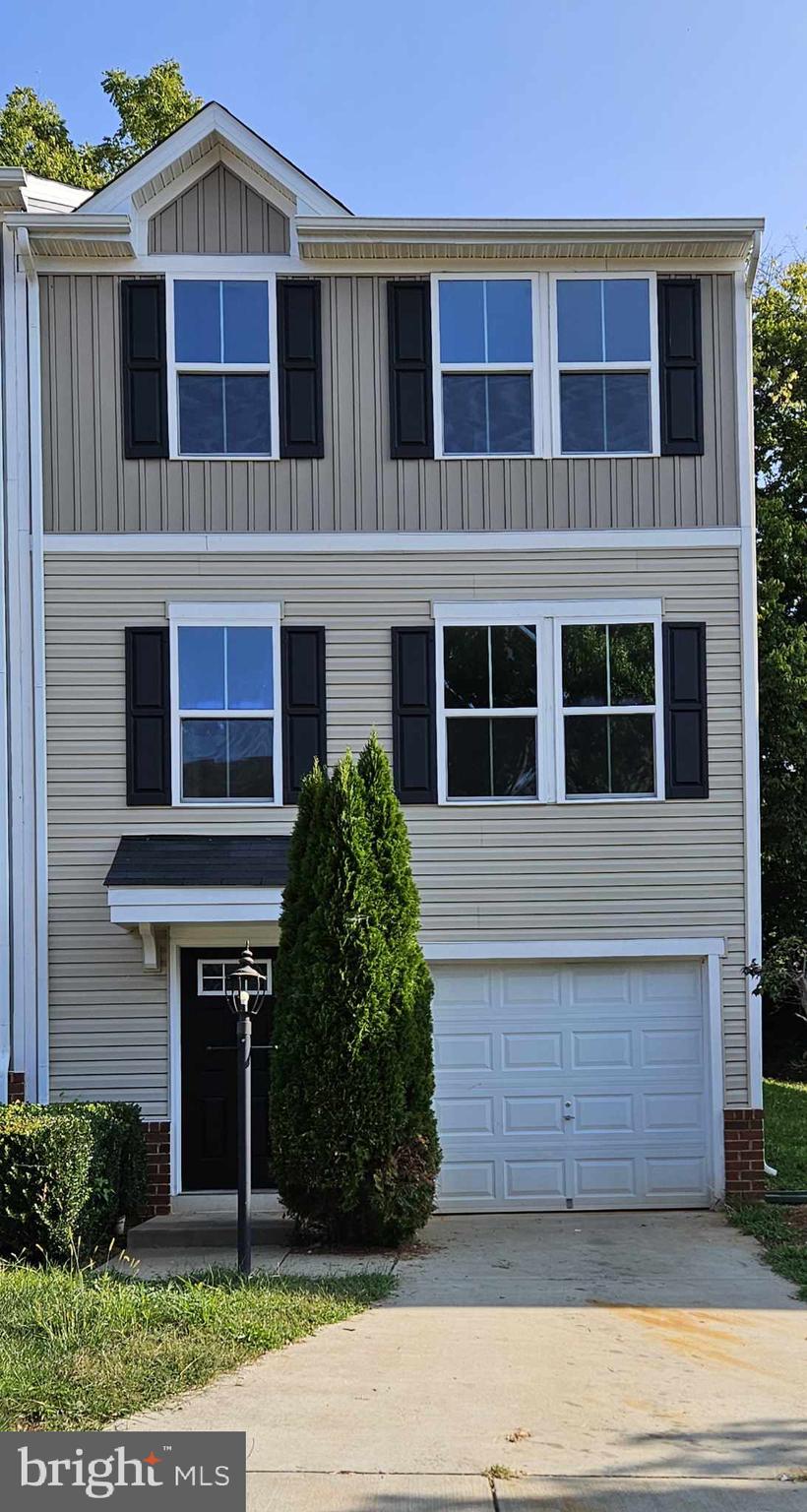 a front view of house with yard