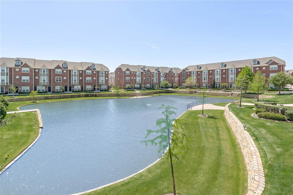 a view of a swimming pool with a lake view