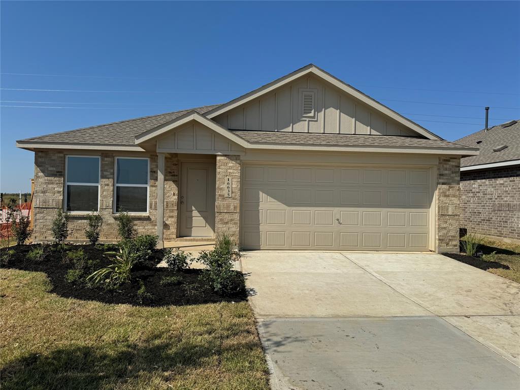 a front view of a house with yard