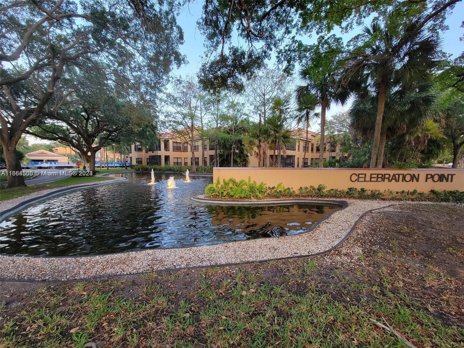 a view of a yard with trees