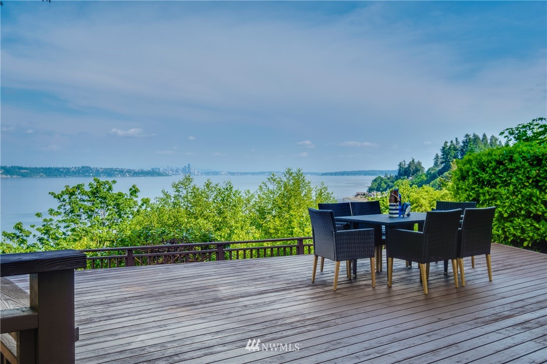 a view of a chairs and table on the wooden floor