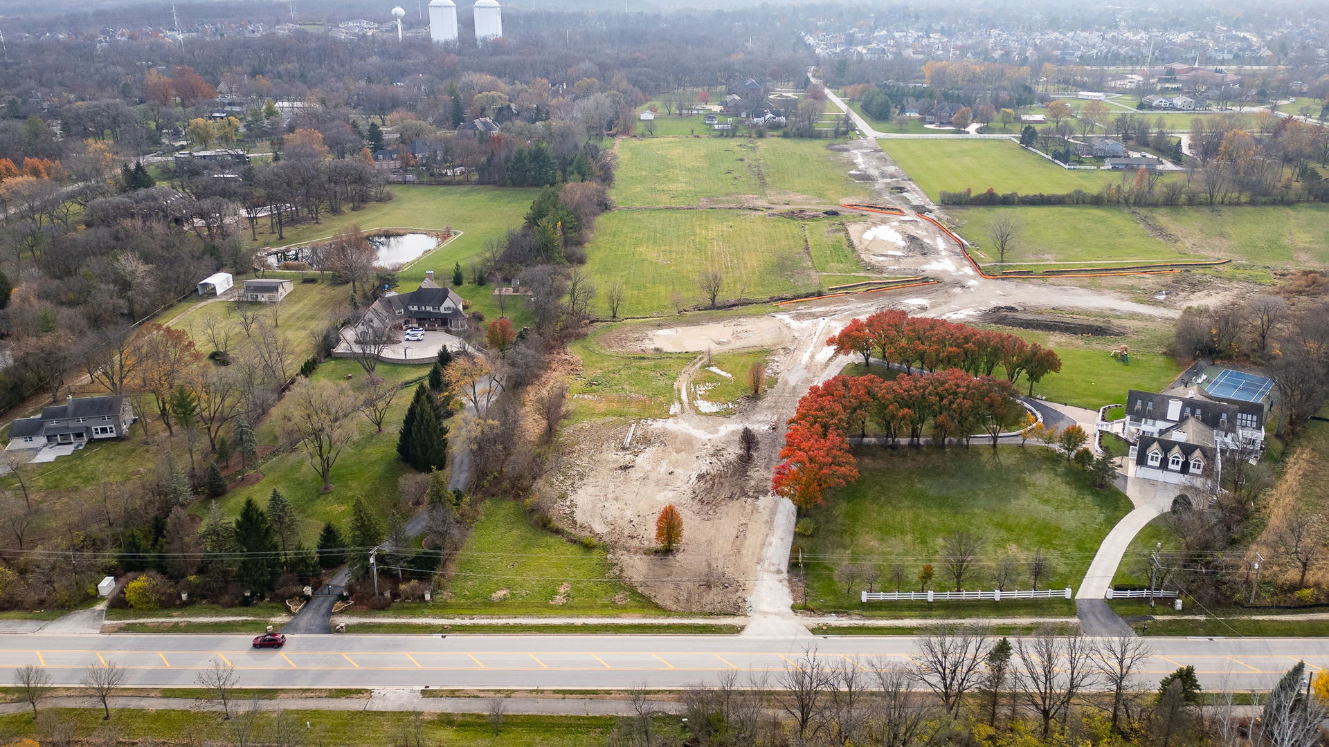 an aerial view of a residential houses with outdoor space