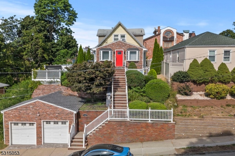 front view of house with a yard