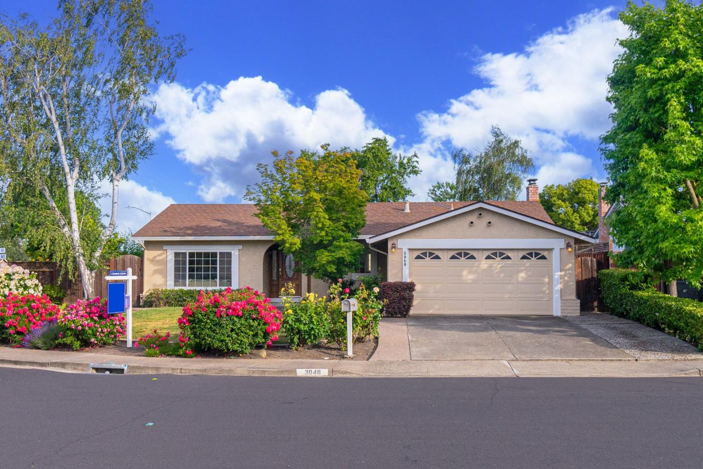 front view of a house with a street