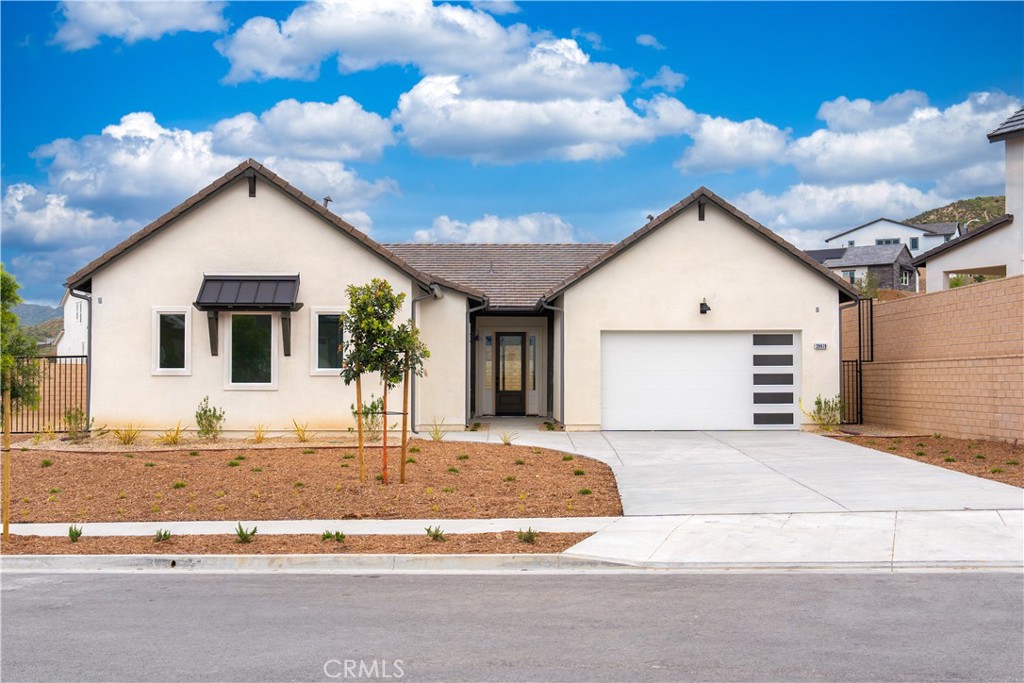 a view of a house with a patio