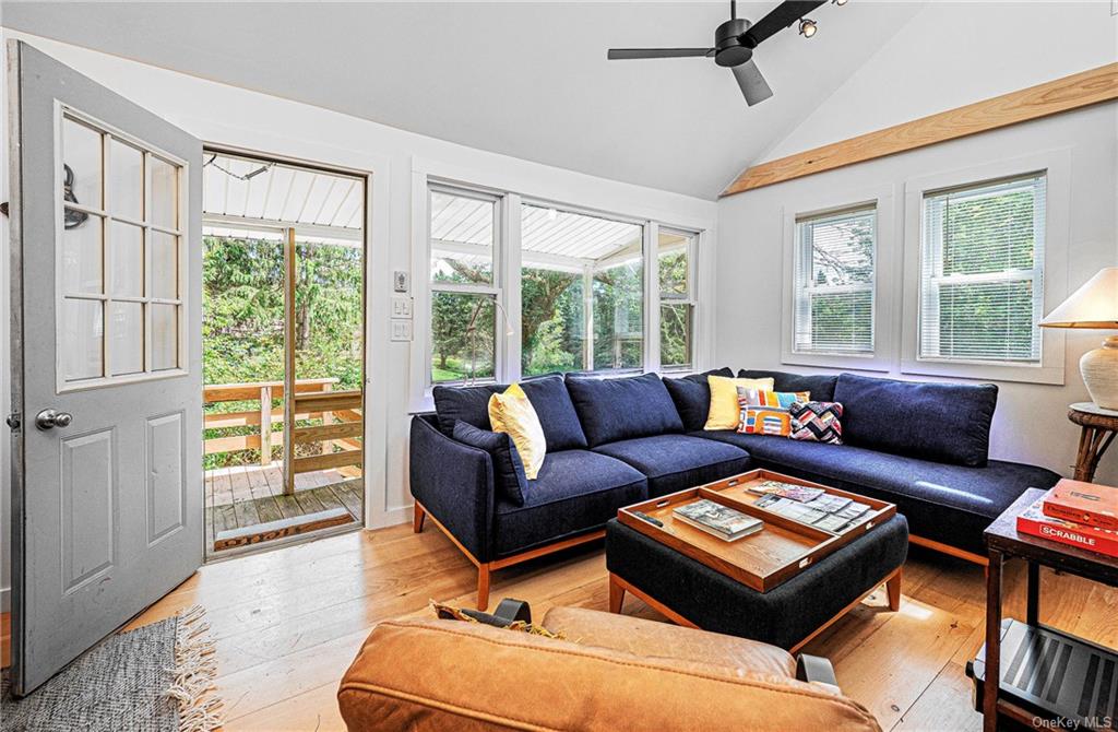 a living room with furniture and a window