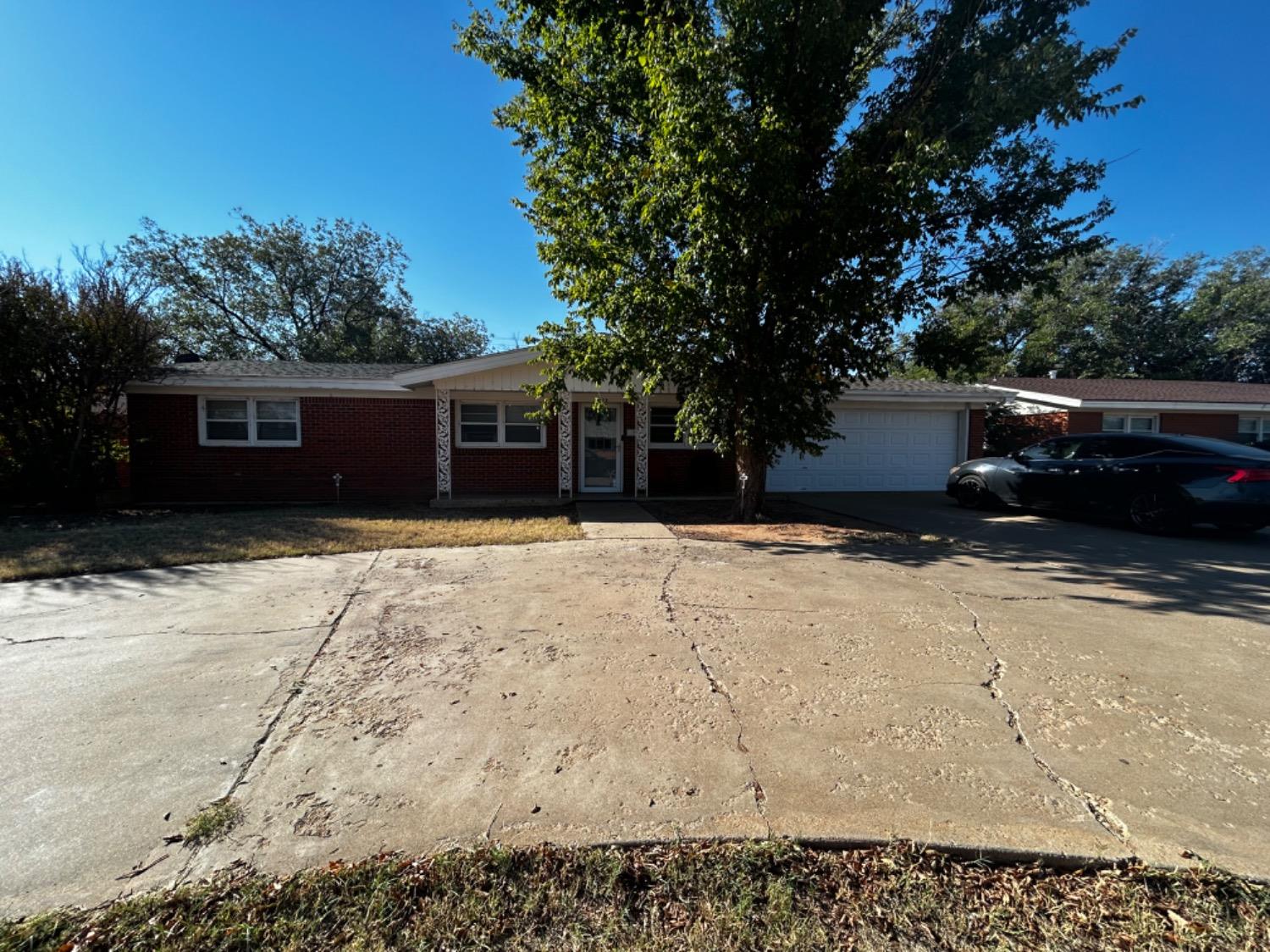 a front view of house with yard