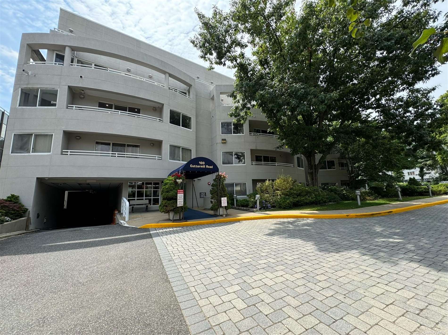 a view of a building with trees