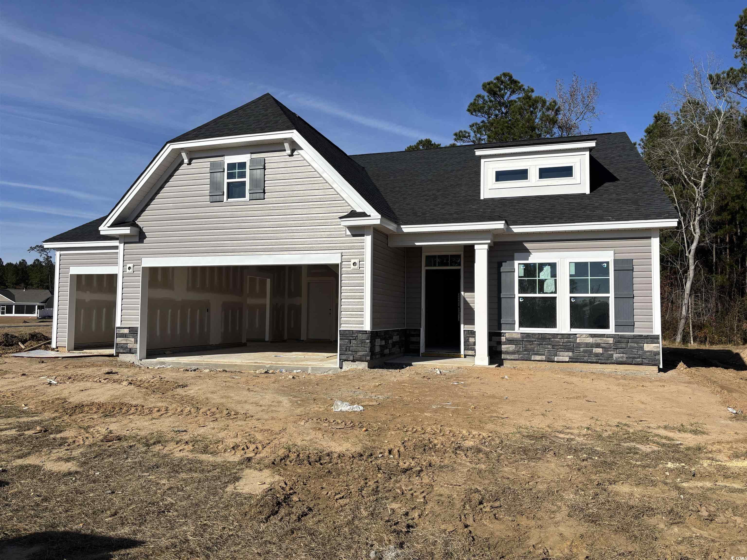 Craftsman-style home with a garage