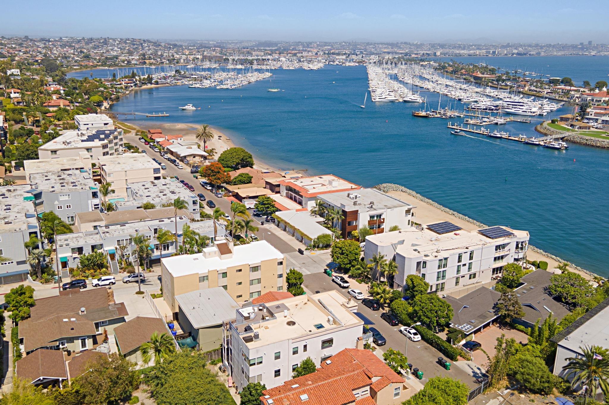 a view of a city with an ocean