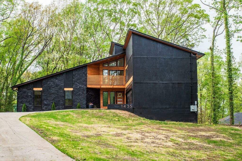 a house view with a backyard space