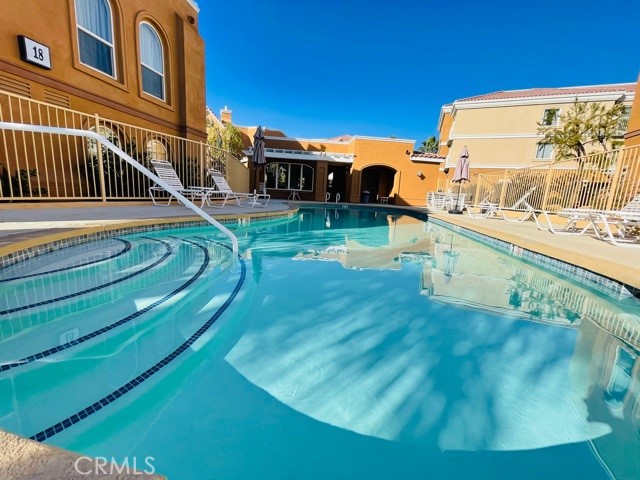 a view of a swimming pool with a garden