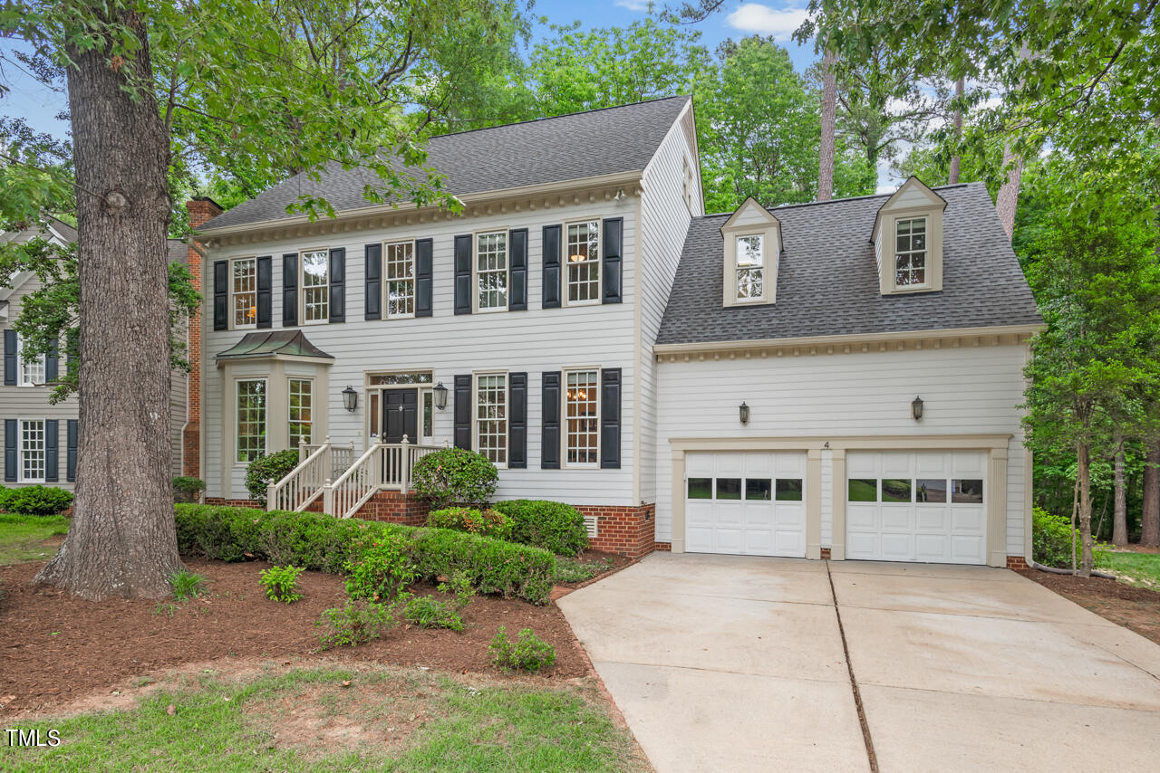 front view of house with a garden