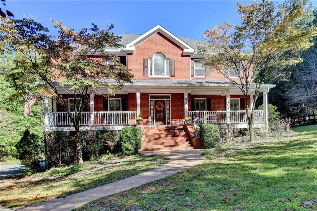 front view of a house with a yard