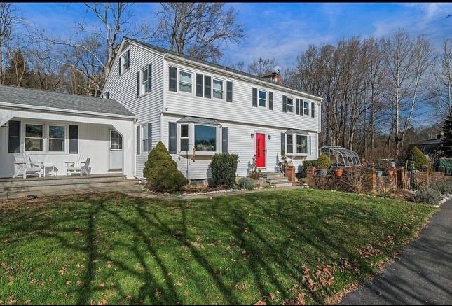 View of front of home with a front yard