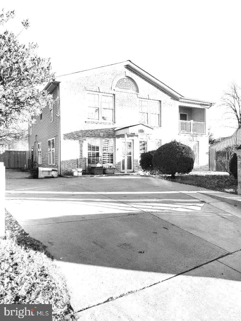 a black and white photo of a house