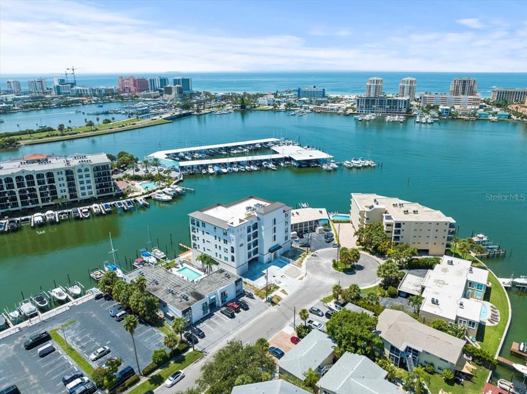 an aerial view of lake residential house with outdoor space and seating