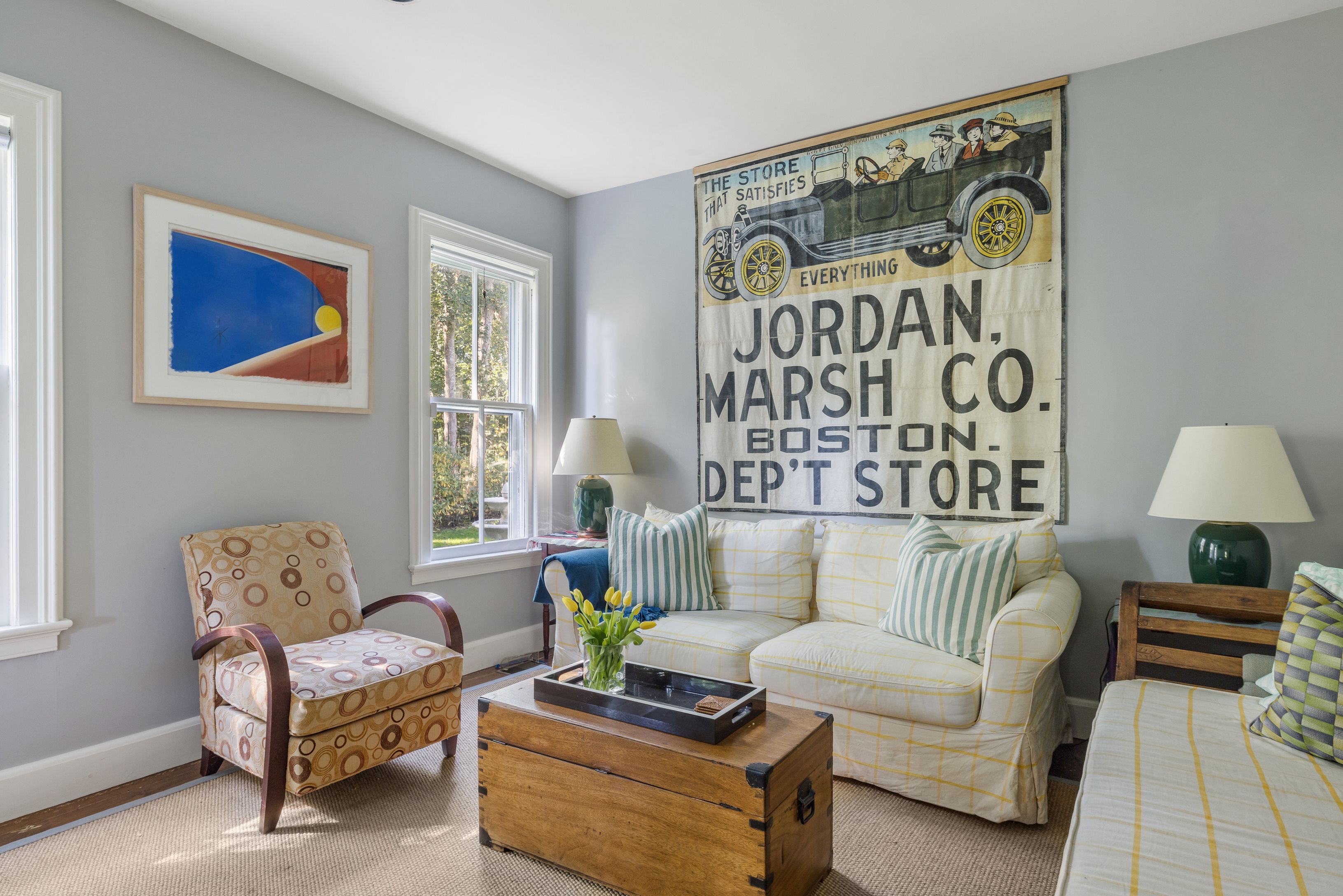 a living room with furniture and a window