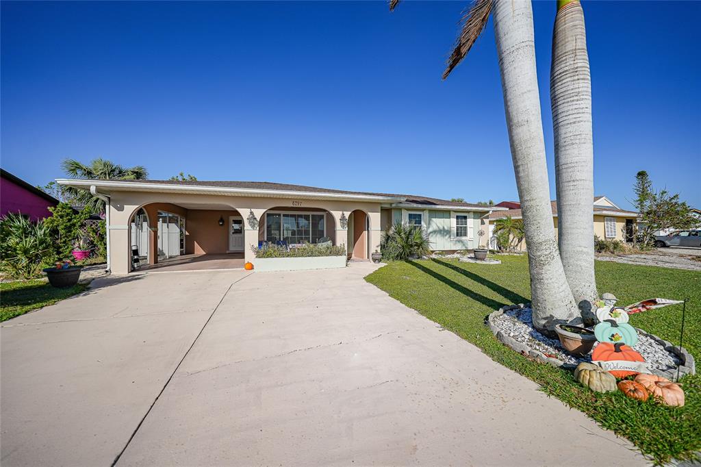 a front view of house with outdoor space and street view