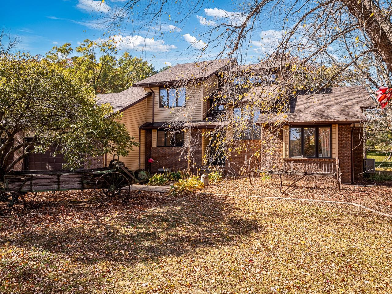 a house with trees in front of it