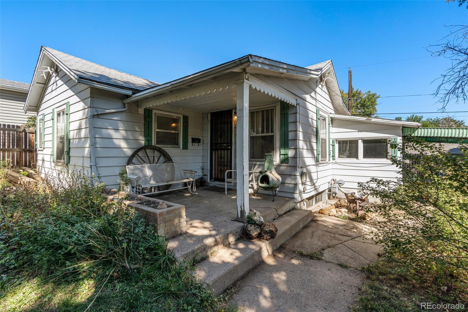 a front view of a house with patio