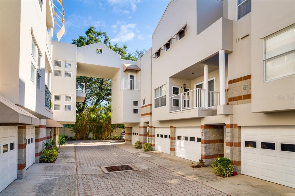 a view of a building with a garden