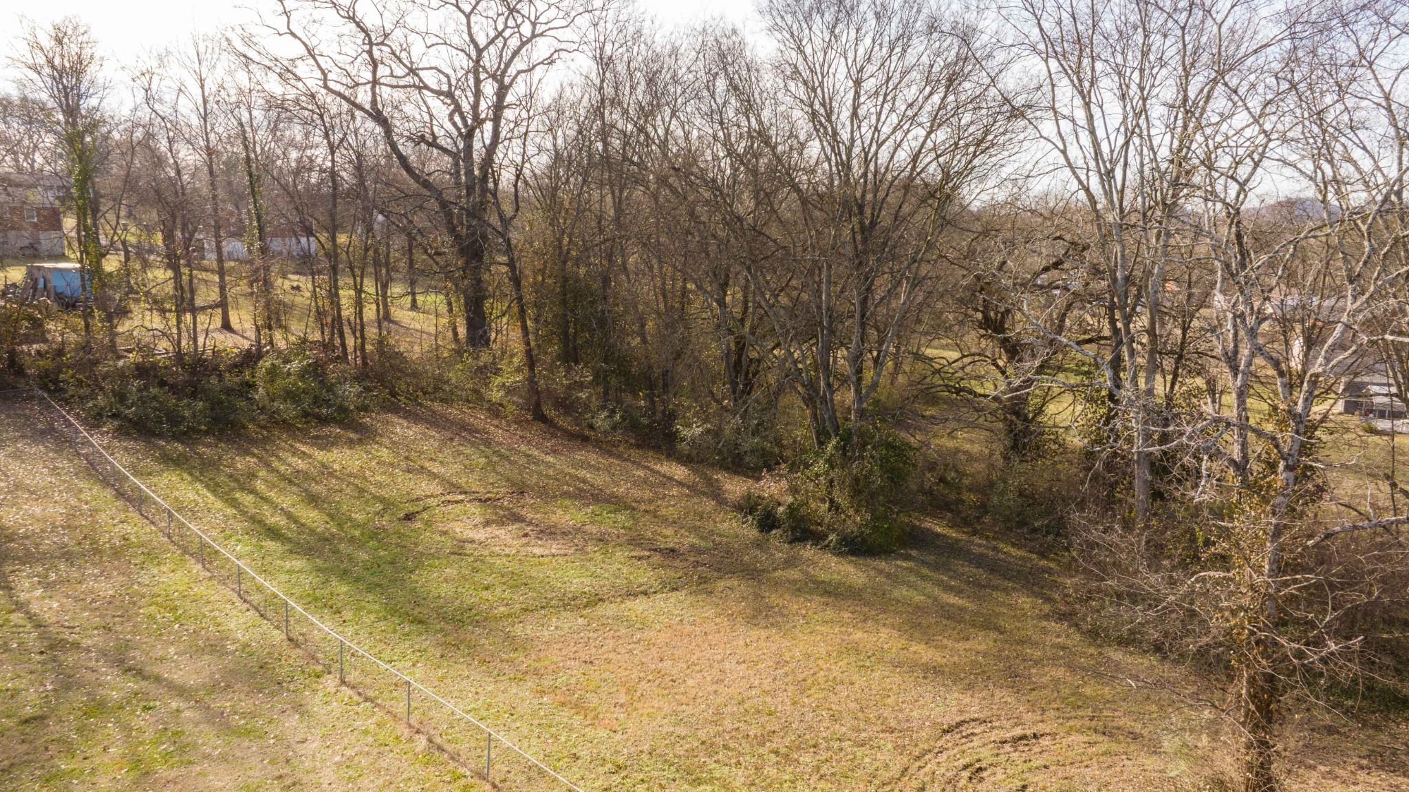 a view of backyard with green space