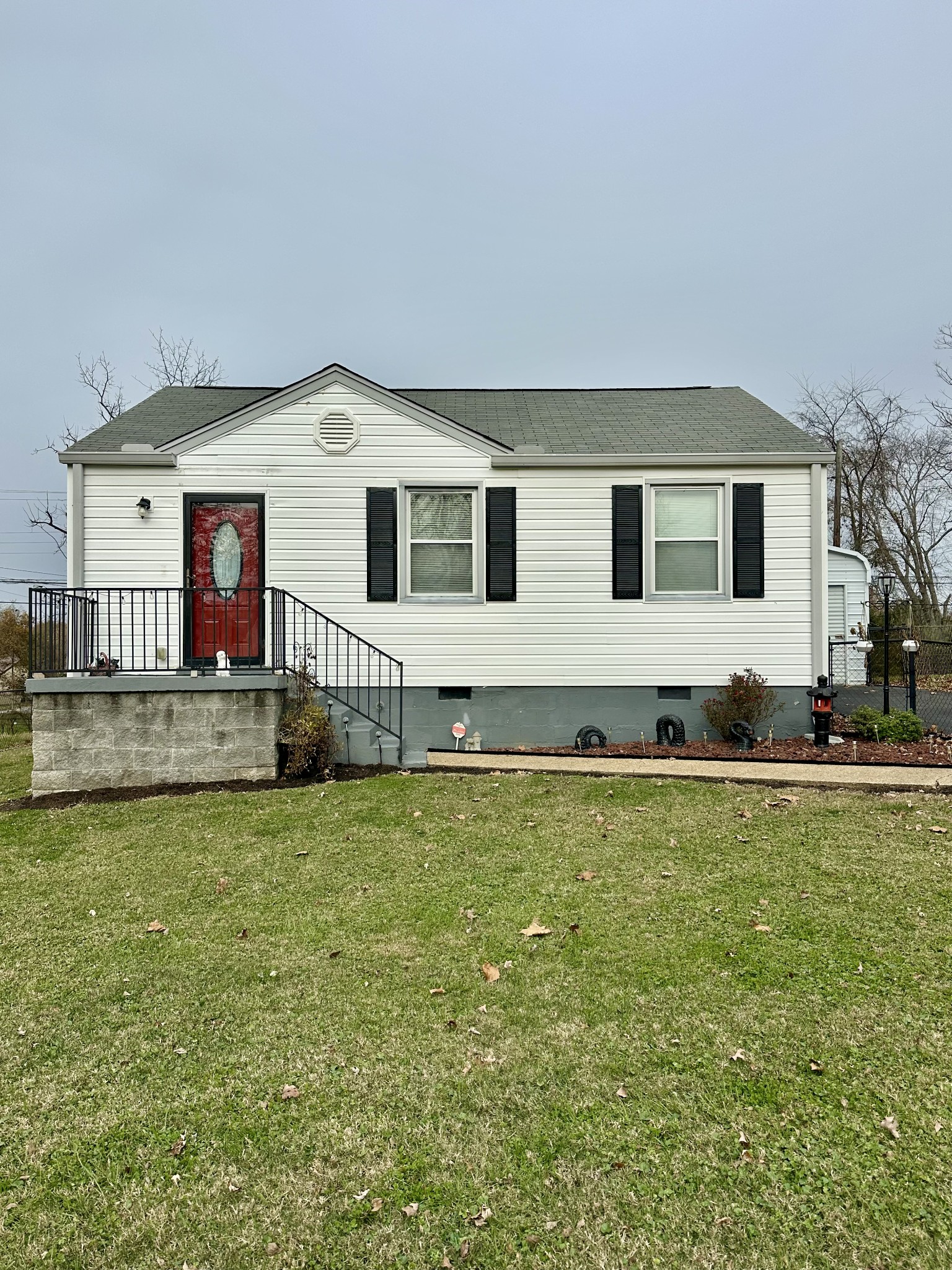 a house view with a garden space