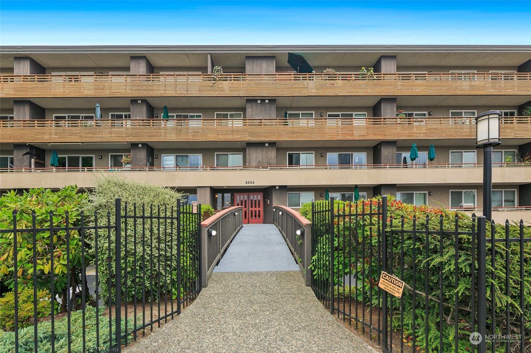 a view of a balcony with shelves