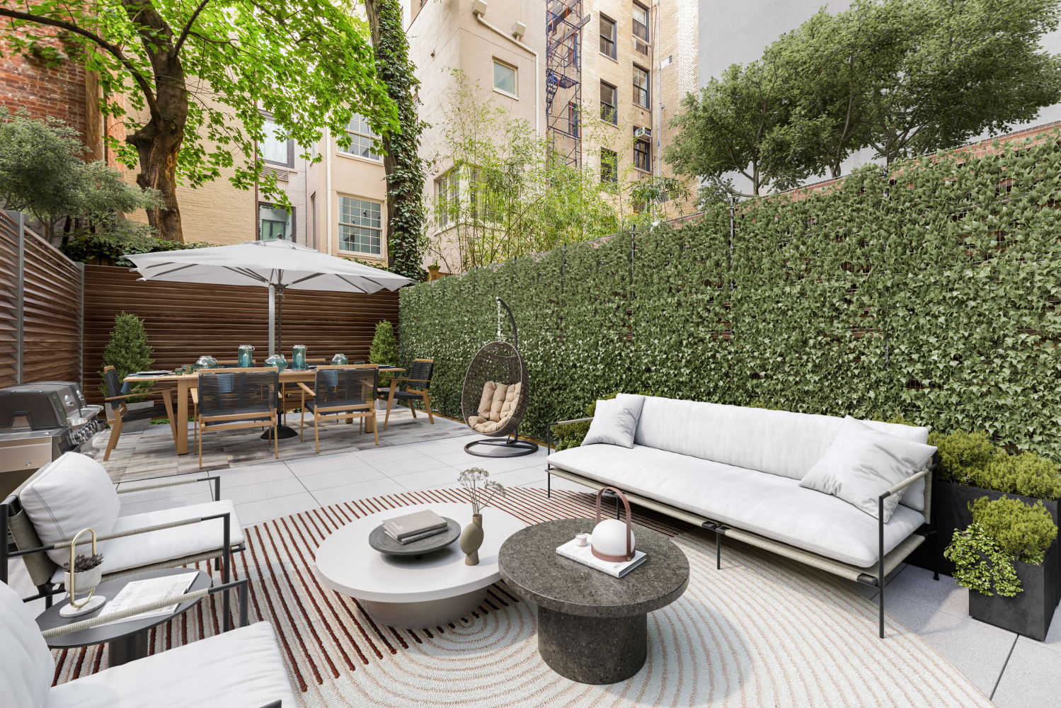 a view of a patio with furniture and a fire pit