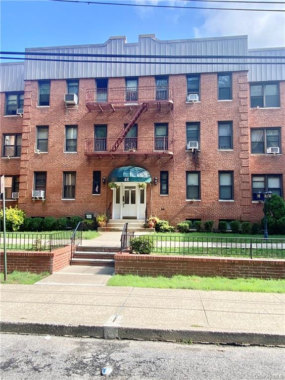 front view of a house with a street